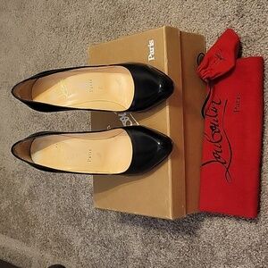 Black Louboutin pumps, size 8.5/38.5